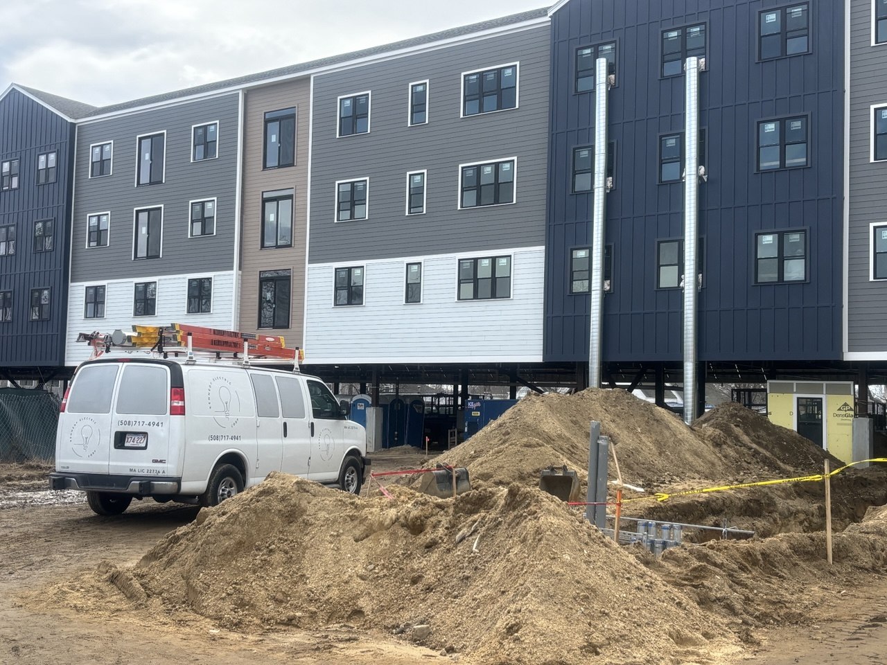 Active construction site — KEC van and excavation
