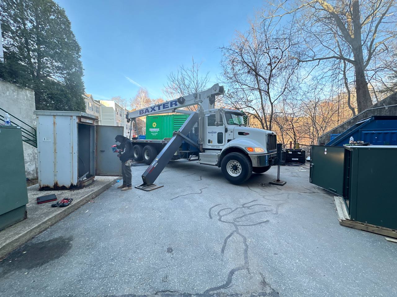 Crane setting the new 4000A combiner enclosure at Maplewood Weston