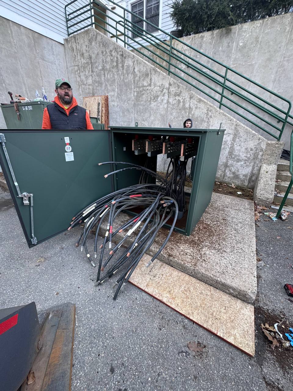 New green enclosure — parallel conductors being fed in