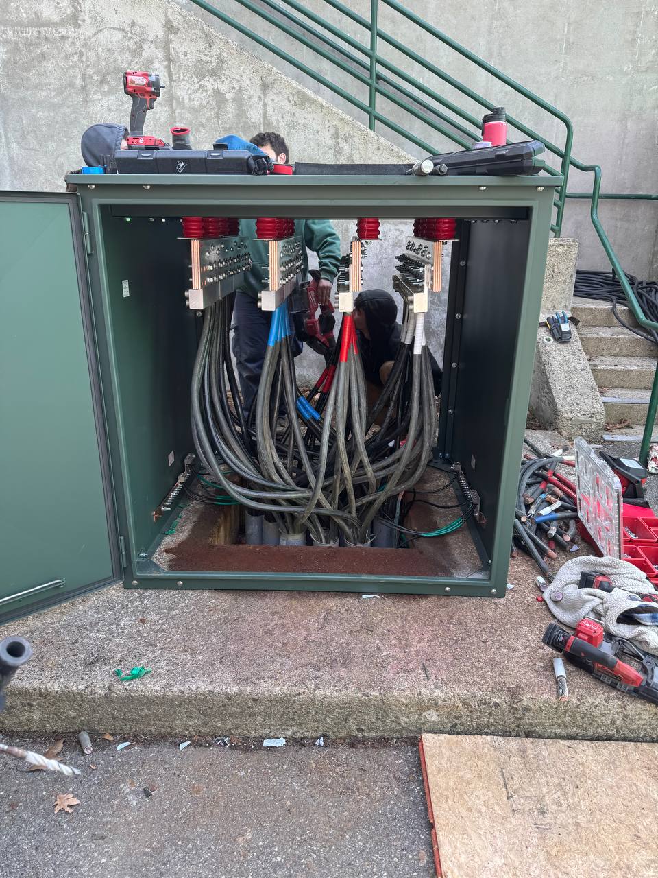 Interior of completed new combiner — bus bars and conductor terminations